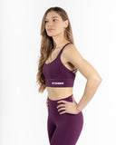 Women violet sport bra straps side view