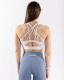 Women white sport bra back view