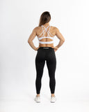 Women white sport bra back view