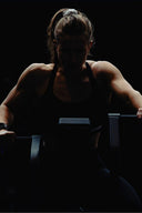 Woman training in a crossfit gym