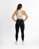 Women white sport bra back view