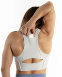 Women white sport bra mouvement view